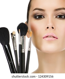 Portrait Of Attractive  Caucasian  Woman Brunette Isolated On White Studio Shot Closeup Makeup Brushes