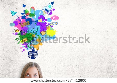 Portrait of attractive caucasian woman with colorful lamp sketch on concrete background. Creative ideas concept