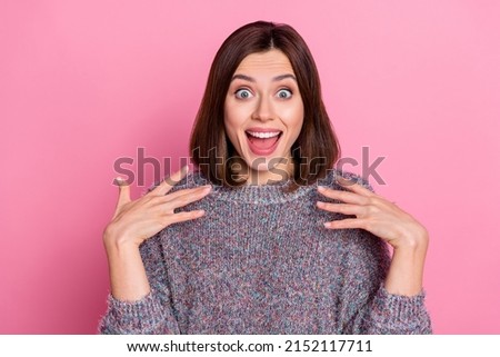 Portrait of attractive cheerful amazed crazy girl having fun incredible sale isolated over pink pastel color background
