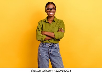 Portrait of attractive cheerful brunette girl hr executive expert folded arms isolated over bright yellow color background - Shutterstock ID 2229162033