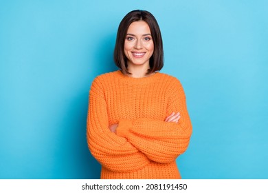 Portrait of attractive cheerful content girl folded arms wearing warm wool jumper isolated over bright blue color background - Powered by Shutterstock