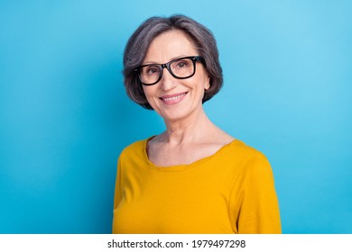 Portrait Of Attractive Cheerful Content Wise Woman Wearing Specs Eye Sight Vision View Isolated Over Vivid Blue Color Background