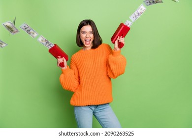 Portrait Of Attractive Cheerful Crazy Cool Girl Shooting Us Banknotes Waste Flow Isolated Over Bright Green Color Background