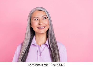 Portrait of attractive cheerful curious gray-haired woman thinking copy space isolated over pink pastel color background - Powered by Shutterstock