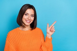 Portrait Of Attractive Cheerful Girl Demonstrating Copy Empty Space Ad Advert Isolated Over Bright Blue Color Background