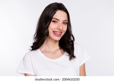 Portrait of attractive cheerful girl wearing braces posing good mood isolated over light grey color background - Shutterstock ID 2004610250