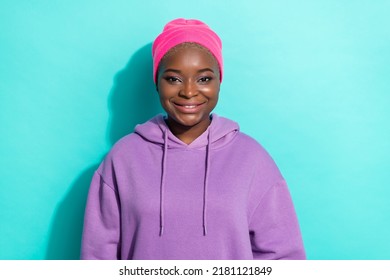 Portrait Of Attractive Cheerful Hippie Girl Wearing Sporty Look Clothes Street Style Isolated Over Bright Teal Turquoise Color Background