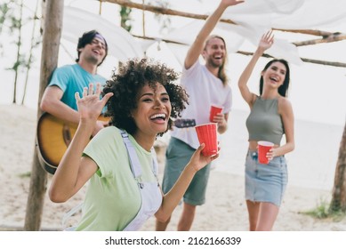 Portrait Of Attractive Cheerful People Friends Buddy Fellow Having Fun Playing Guitar Good Mood Dancing Waving Hello Outdoors