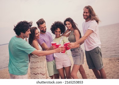 Portrait of attractive cheerful people meeting drinking beer celebrating festal occasion at beach wood outdoors - Shutterstock ID 2165253853