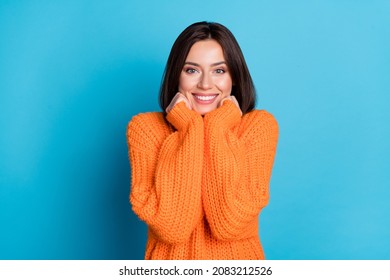 Portrait Of Attractive Cheerful Pleased Delighted Girl Enjoying Wearing Cosy Jumper Isolated Over Vivid Blue Color Background