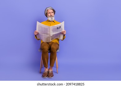Portrait of attractive doubtful gray-haired man reading news copy space isolated over bright violet purple color background - Powered by Shutterstock