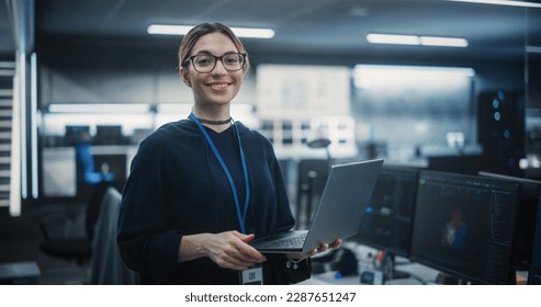 Portrait of an Attractive Empowered Multiethnic Woman Looking at Camera and Charmingly Smiling. Businesswoman at Work, Information Technology Manager, Software Engineering Professional - Shutterstock ID 2287651247