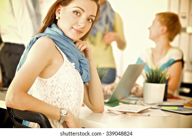 Portrait of attractive female  designer in office - Shutterstock ID 339048824
