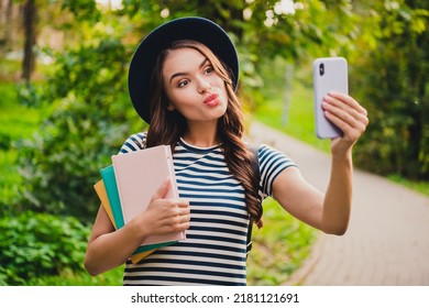 Portrait Of Attractive Flirty Girl Holding Book Taking Making Selfie Video Call Pastime Sending Air Kiss On Fresh Air Outdoors