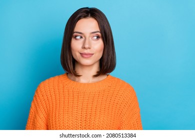 Portrait of attractive girlish cheerful girl looking aside overthinking isolated over bright blue color background