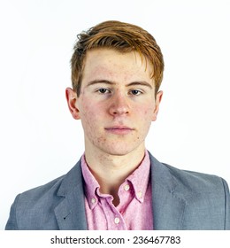 Portrait Of Attractive Laughing Smiling Boy In Puberty In Studio