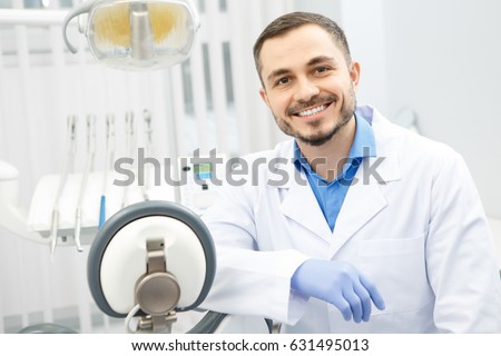 Portrait of an attractive male dentist sitting at his office copyspace profession occupation doctor medicine clinic help experience trustworthy specialist care health vitality dentistry dental oral