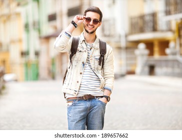 Portrait Of Attractive Man With Casual Clothes Walk In Europe