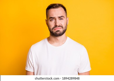 Portrait of attractive miserable capricious bearded guy feeling bad isolated over bright yellow color background - Powered by Shutterstock