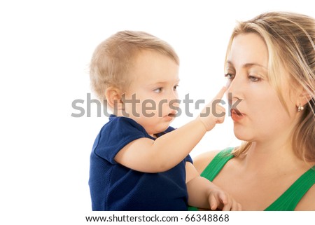Portrait of attractive mother and nice child,  playing together