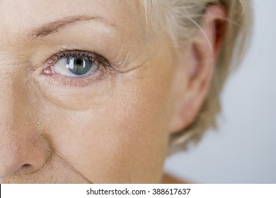 A portrait of an attractive senior woman, close-up of eye - Powered by Shutterstock