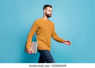 Portrait Of Attractive Skilled Guy Carrying Laptop Walking Meeting Office Isolated Over Bright Blue Color Background