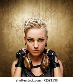 Portrait Of An Attractive Steam Punk Girl With Headphones