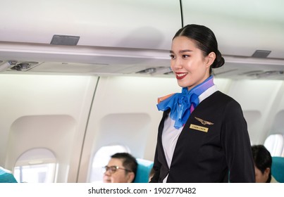 Confident Pretty Flight Attendantstewardess Standing Smile Stock Photo ...