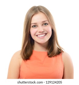 Portrait Of Attractive Teenager Girl Smiling In Cheerful Mood, Over White