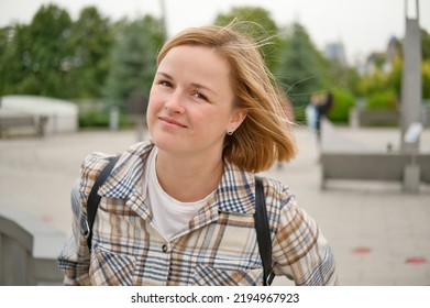 Portrait Of Attractive White European Woman In The City Outdoors. Happy Smiling Beautiful Woman.