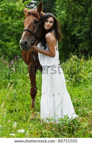 portrait attractive woman full length next horse