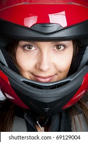 Portrait Of Attractive Woman In Motorbike Helmet