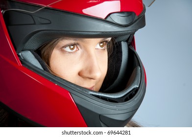 Portrait Of Attractive Woman In Motorbike Helmet Looking Aside