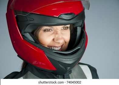 Portrait Of Attractive Woman In Motorbike Helmet Looking Aside