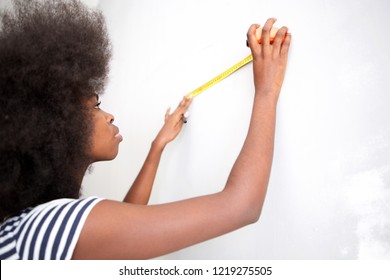 Portrait Of Attractive Young Black Woman Doing Home Improvement