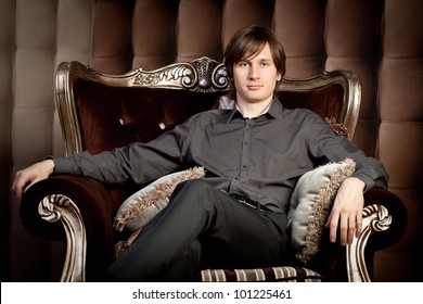 https://image.shutterstock.com/image-photo/portrait-attractive-young-man-sitting-260nw-101225461.jpg