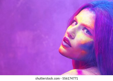 Portrait of attractive young woman with amazing body-art, closeup