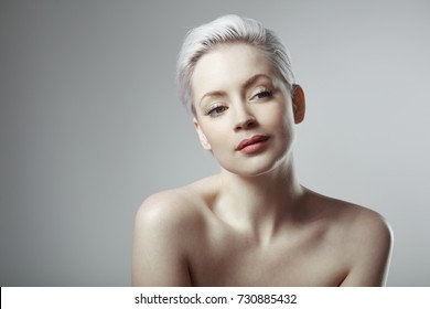 Portrait Of Attractive Young Woman With Bare Upper Body.