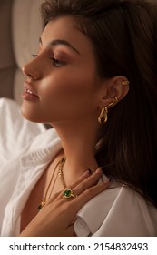 Portrait Of Attractive Young Woman With Jewellery .