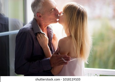 Old man and young woman