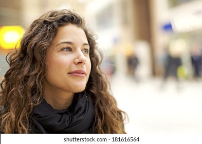 Portrait Of An Attractive Young Woman In A Warm Positive Gaze