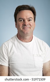 Portrait Of An Average Man In A Blank White T-shirt.