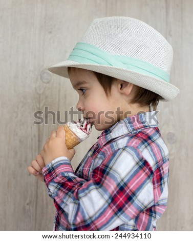 Portrait of baby child with sweet ice cream