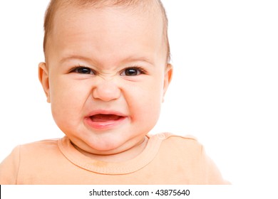 Portrait Of A Baby With Disgust Facial Expression