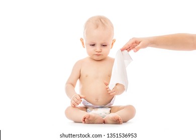 Portrait Of A Baby Getting A Diaper Change: Mom Wiping Baby's Bottom With Baby Wipe Isolated On A White Background. Concept Cleaning Wipe, Pure, Clean.