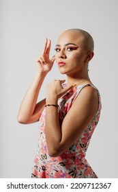 Portrait Of A Bald Girl In A Flower Dress. Young Hairless Teenager Sure Of The Image Of Her. Hairless Colombian Woman Being Vain. Person Breaking Beauty Standards And Stereotypes