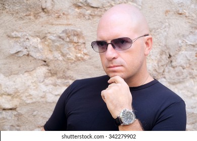 Portrait of a bald headed man