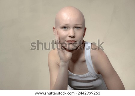 Similar – Image, Stock Photo Portrait of a young, very short-haired woman wearing an off-the-shoulder top through which you can see her nipples