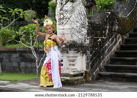 Portrait of a Balinese woman wearing a traditional dancer costume in Pura Lempuyang Temple