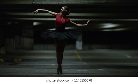 Portrait Of Ballet Dancer Dancing In An Underground Car Park